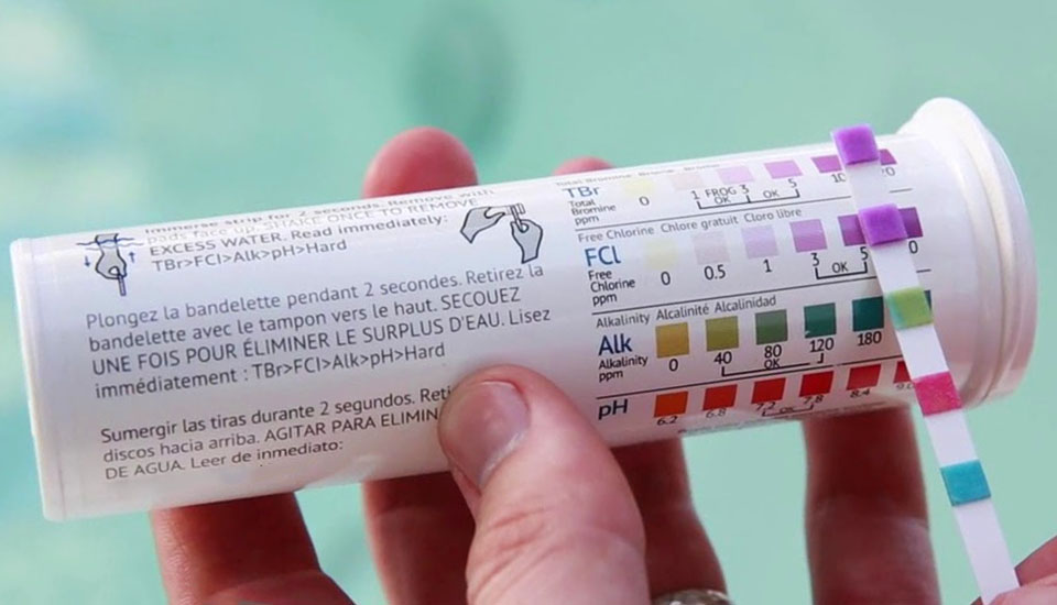 An example of using hot tub test strips to check alkalinity levels